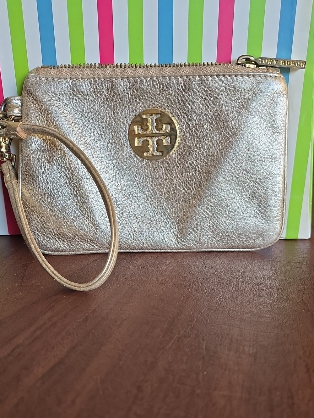 Tory Burch Metallic Champagne Leather Wristlet with Logo Medallion